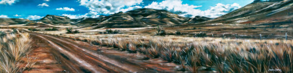 Karoo Road - Giclée print of oil painting of a dirt road winds through a vast, arid landscape with dry grasses and sparse vegetation under a bright blue sky with scattered clouds. Rugged hills rise in the background.