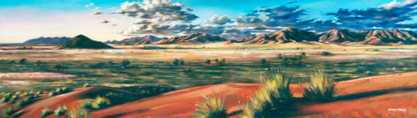 Red Dunes - Giclée print of oil painting of desert landscape with red dunes in the foreground, sparse vegetation, and a vast plain. Mountain range and dramatic clouds under a blue sky.